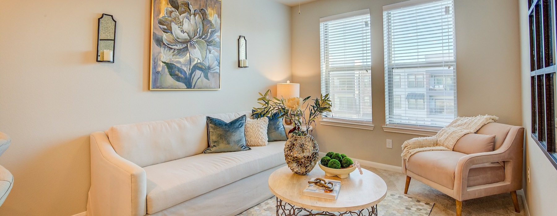 a living room with a couch and a table