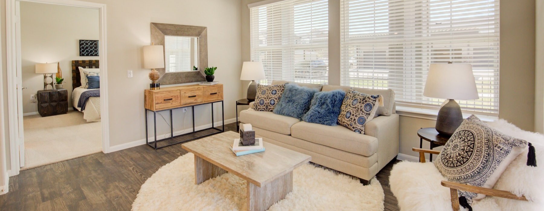 a living room with a couch and a table