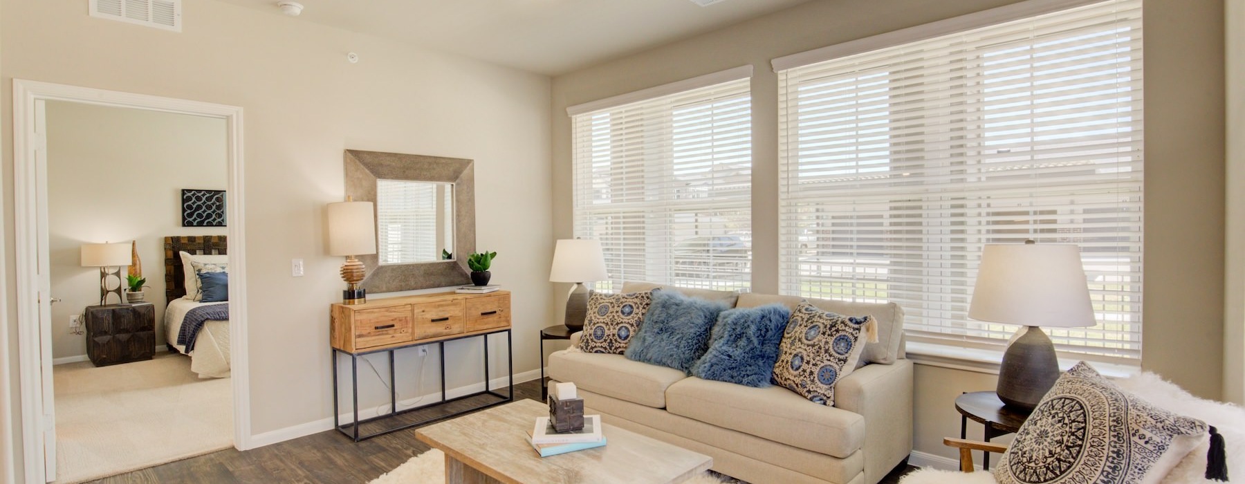 a living room with a couch and a table