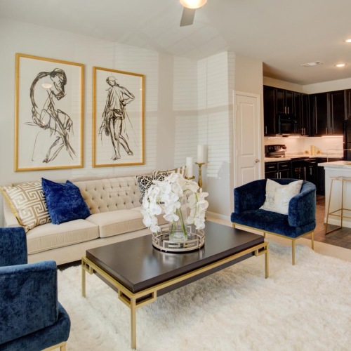 a living room with a couch and a table